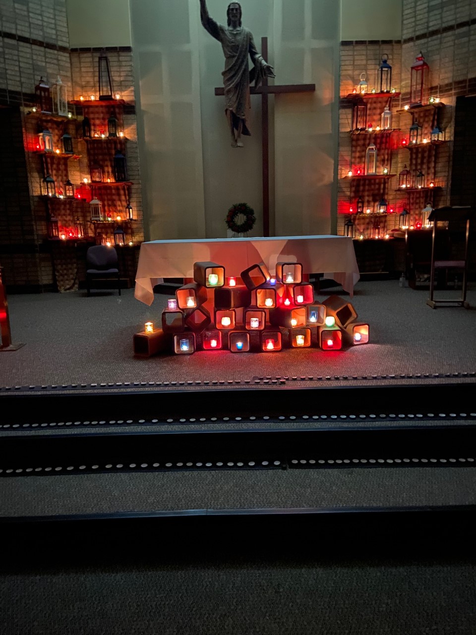 lit candles for vespers in front of altar